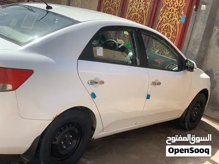 Kia Cerato 2012 photo 2