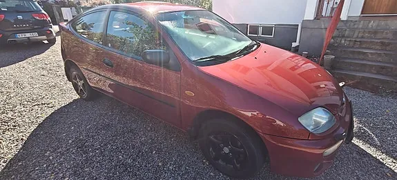 Mazda 323C 1997 photo 2
