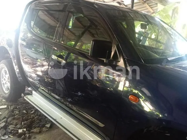 Mitsubishi L200 2007 photo 4