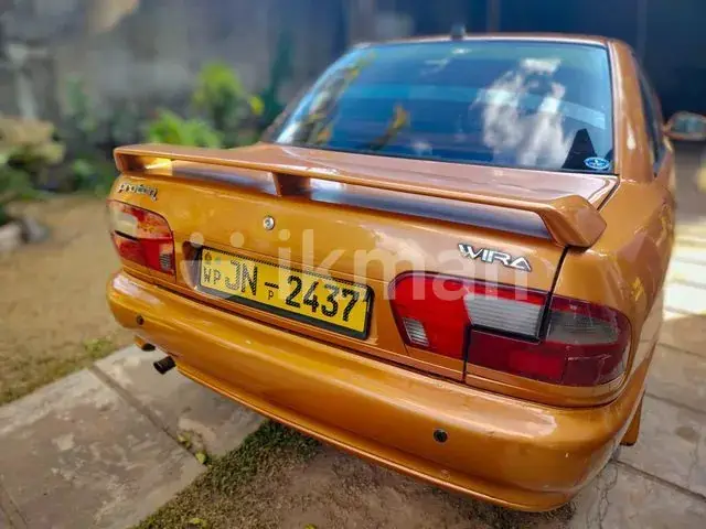 Proton Wira 2001 photo 2
