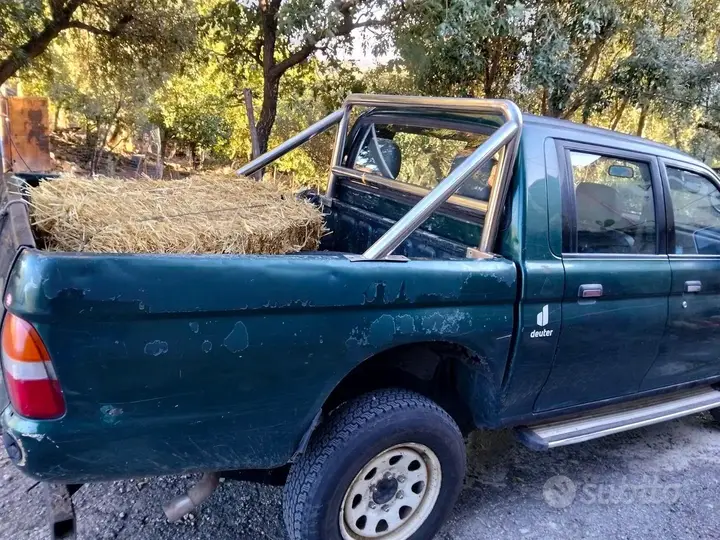 Mitsubishi L200 1997 photo 2