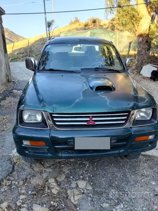 Mitsubishi L200 1997 photo 4