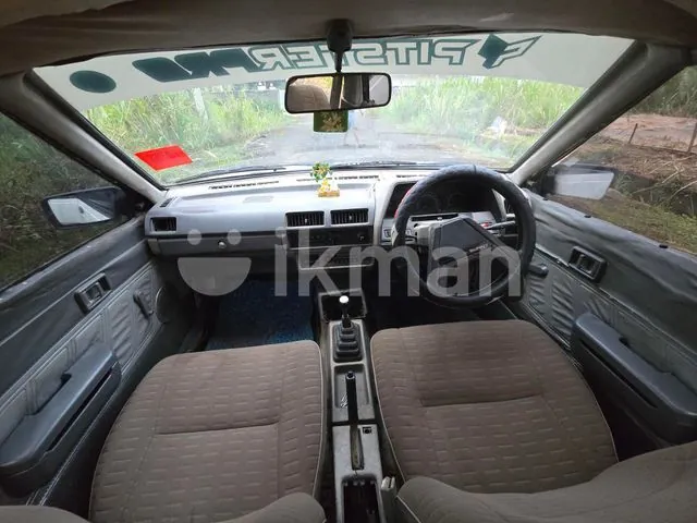 Nissan B11 1983 photo 3