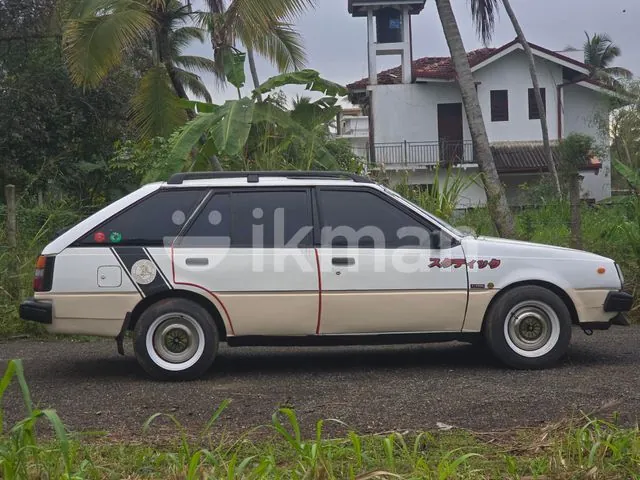 Nissan B11 1983 photo 5