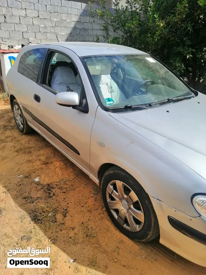 Nissan Almera 2002 photo 2