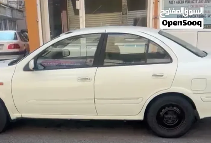 Nissan Sunny 2004 photo 3