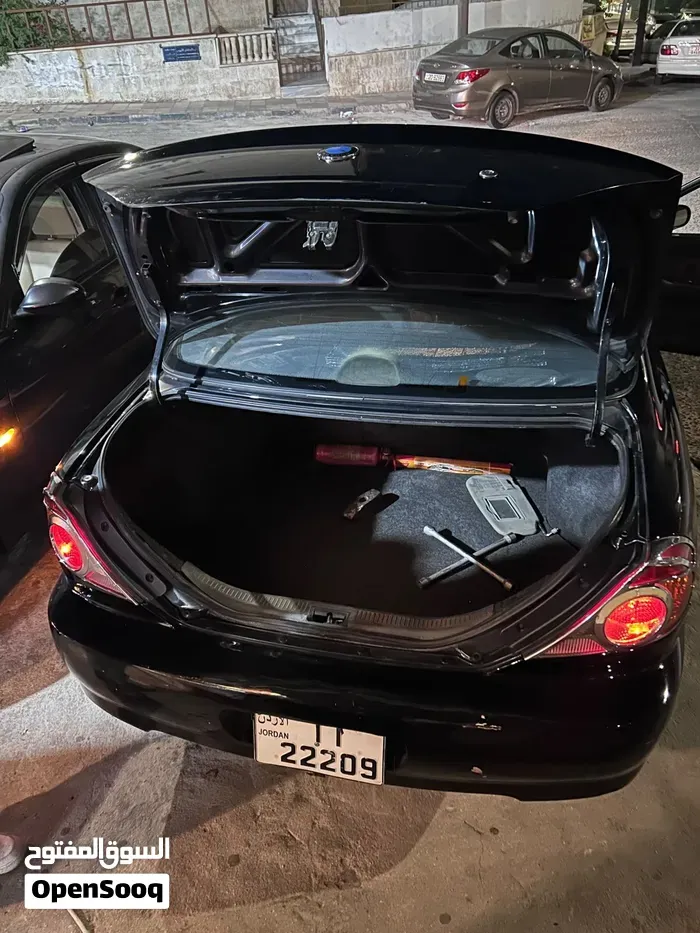 Kia Spectra 2000 photo 3