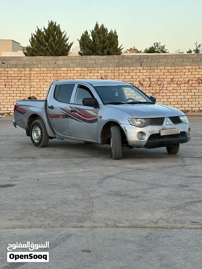 Mitsubishi L200 2008 photo 2